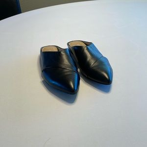 Black flat mules. Never worn